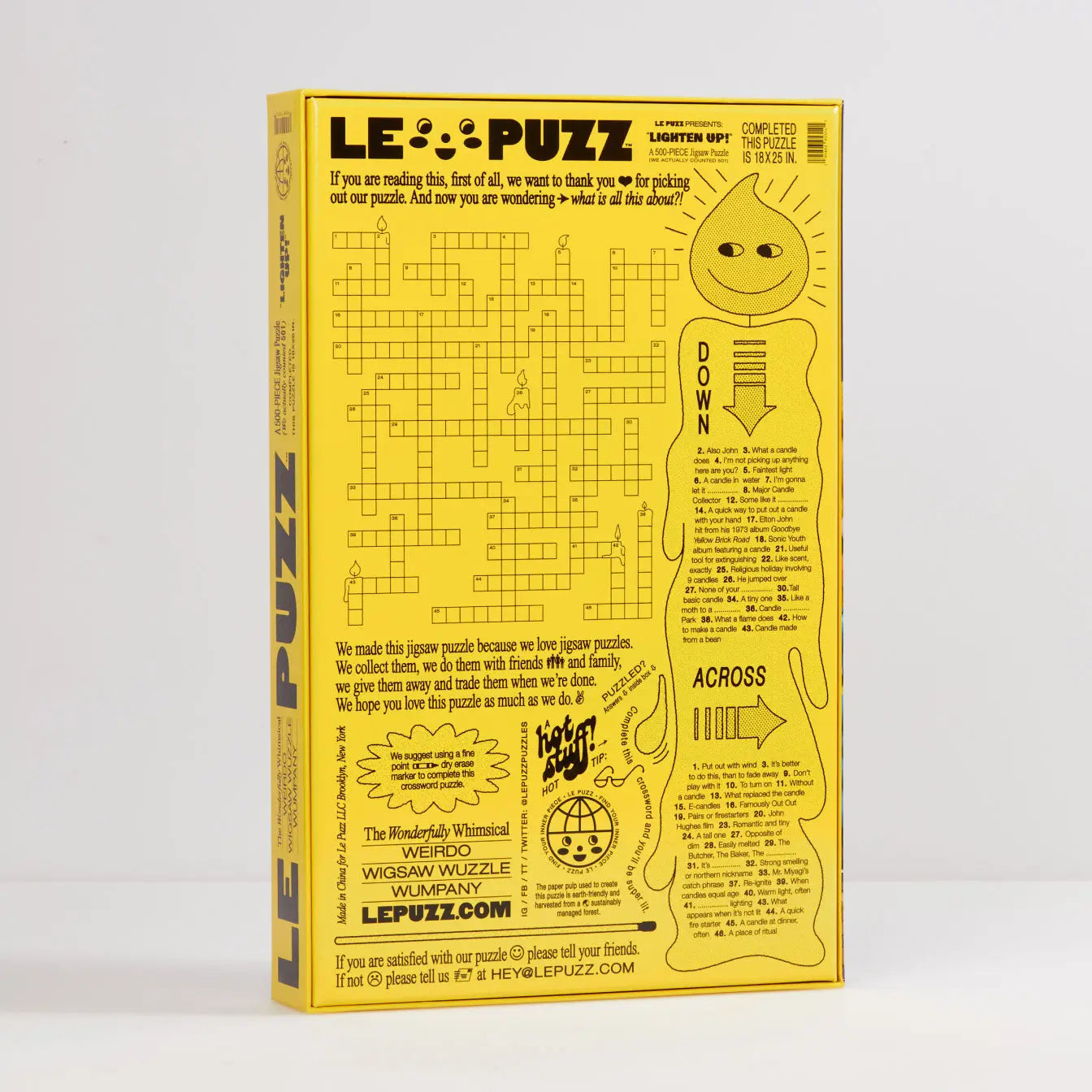 Yellow puzzle box with a crossword-style design on a white background
