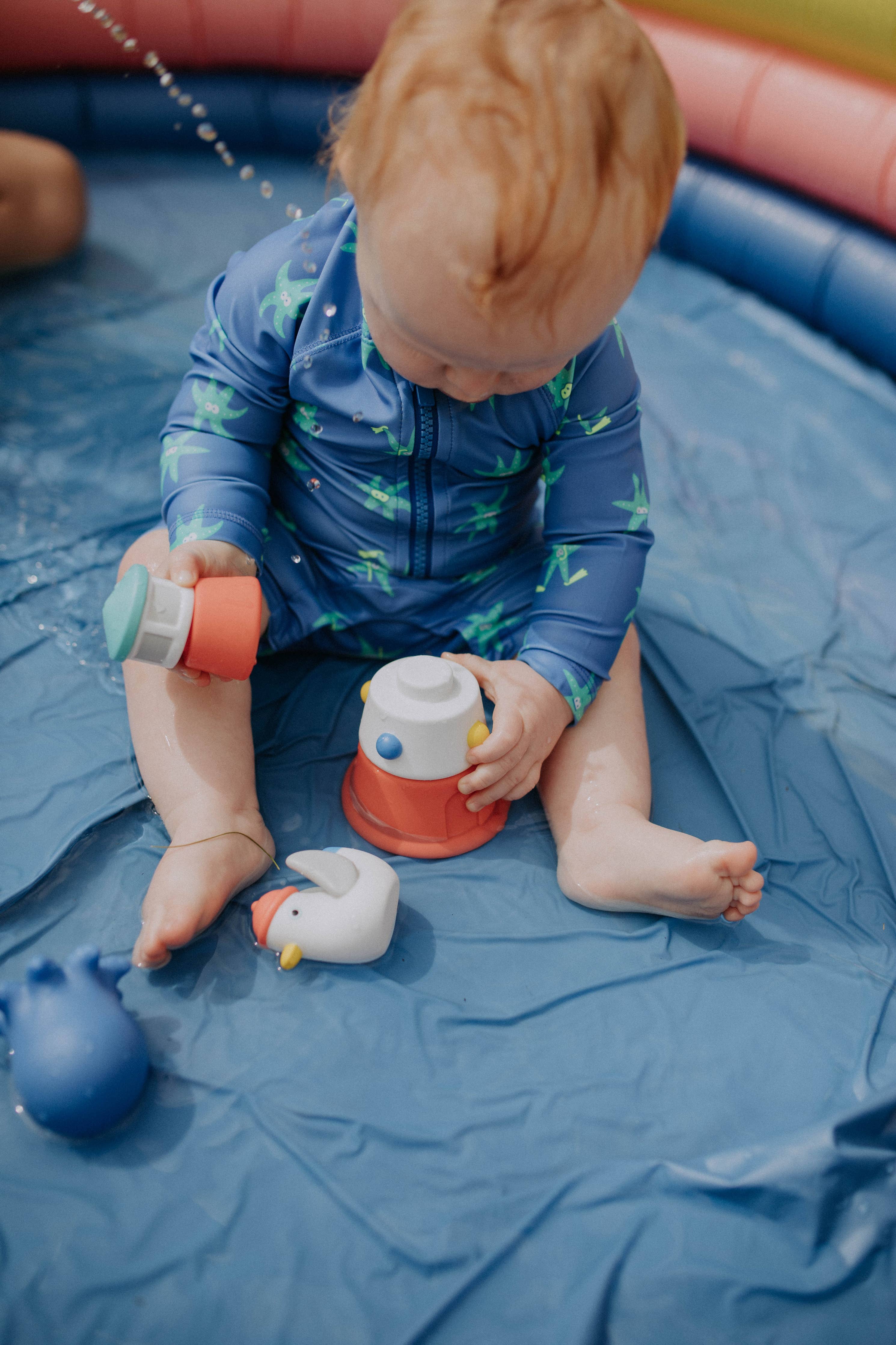 Itzy Stack & Squirt Bath + Water Toy