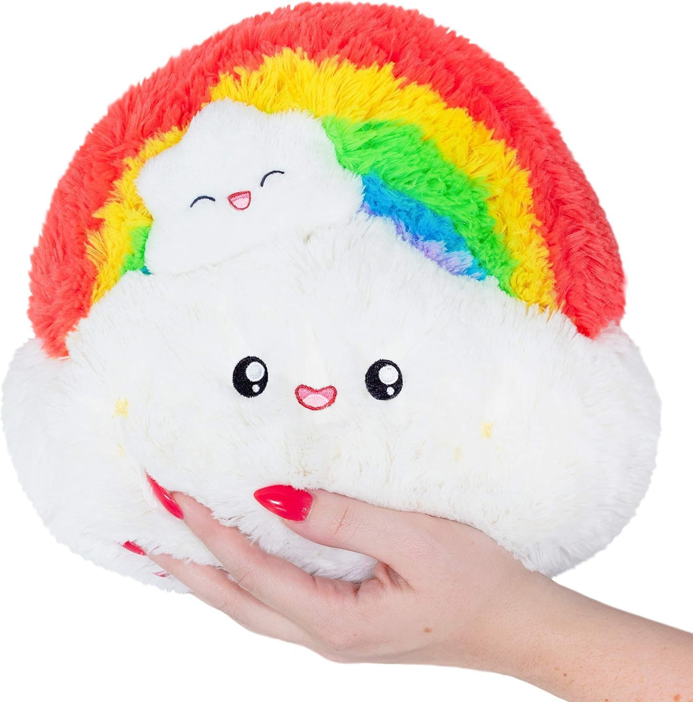 A plush toy shaped like a cloud with an embroidered smiling face and a rainbow on top.