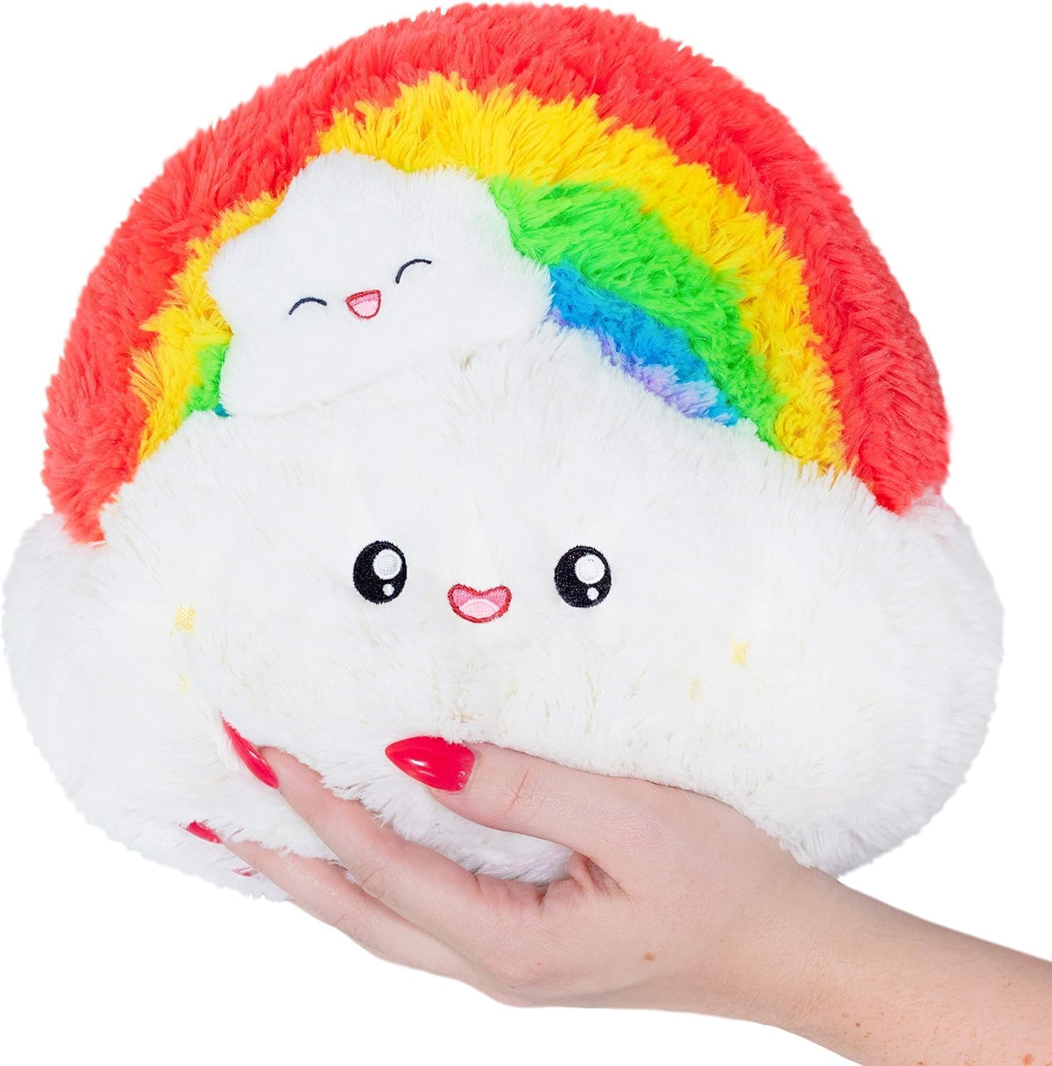 A plush toy shaped like a cloud with an embroidered smiling face and a rainbow on top.