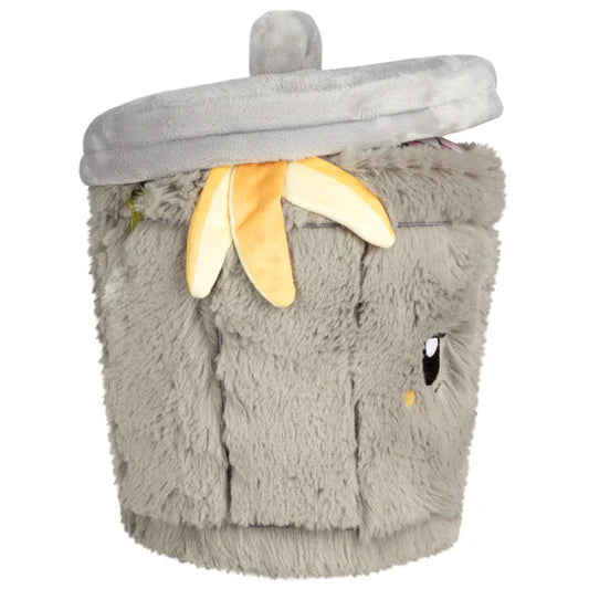 Side view of the plush trash can with a banana peeking out from the lid.